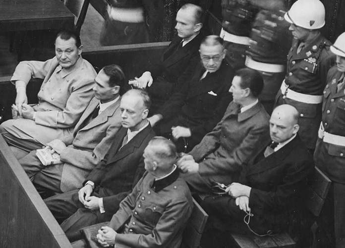 Nazi defendants sitting in the dock during the Nuremberg Trials. Source: National Archives and Records Administration