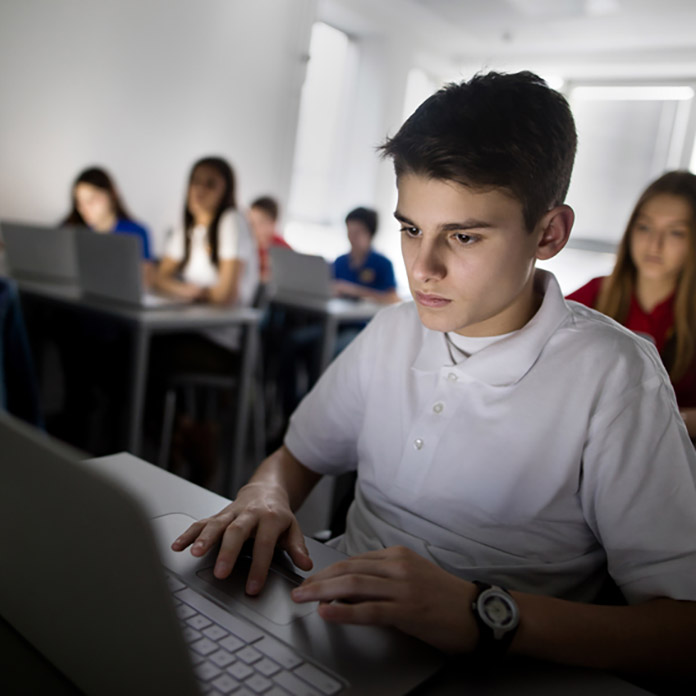 student studying on laptop