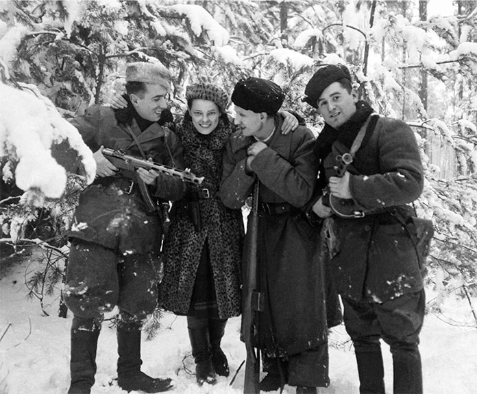 Faye Schulman with fellow Jewish partisans in the forests near Lenin. 1944